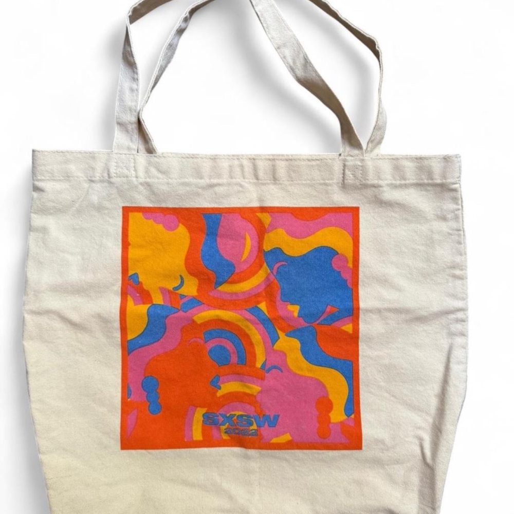 2022 SXSW festival cream and multi-colored canvas tote bag.